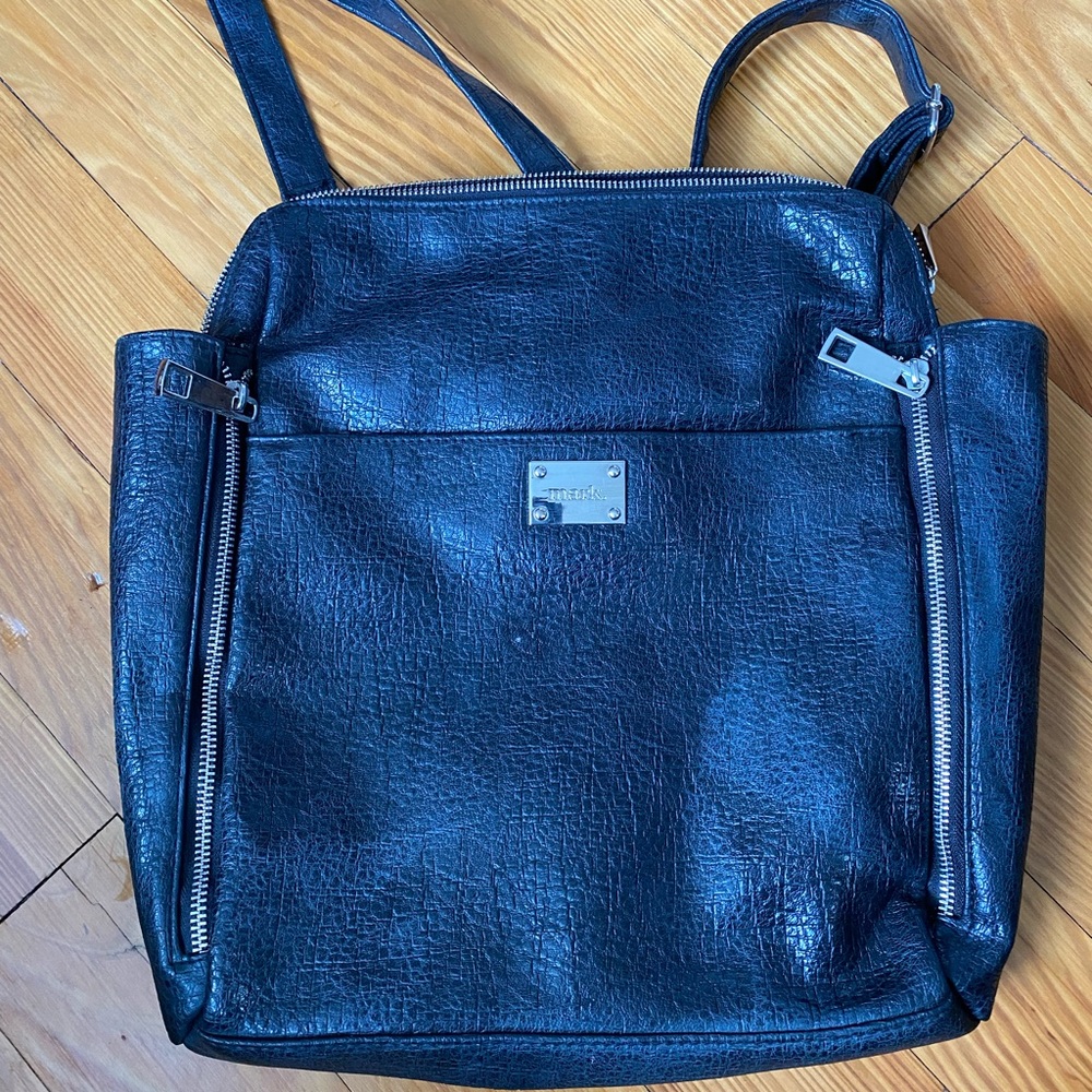 mark. Pebbled leather backpack